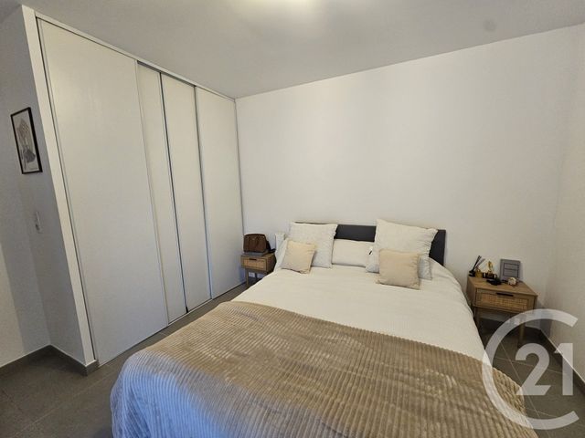 Afficher la photo en grand Appartement F3 à vendre - 3 pièces - 66.28 m2 - JUVIGNAC - 34 - LANGUEDOC-ROUSSILLON - Century 21 Terre Du Sud