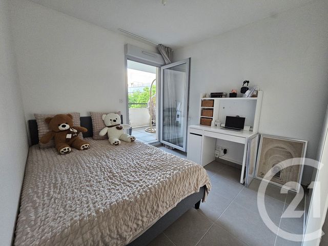 Afficher la photo en grand Appartement F3 à vendre - 3 pièces - 66.28 m2 - JUVIGNAC - 34 - LANGUEDOC-ROUSSILLON - Century 21 Terre Du Sud